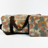 <tc>Pack</tc>en Sie eine Camo-Sporttasche + <tc>Laptop-hülle</tc>